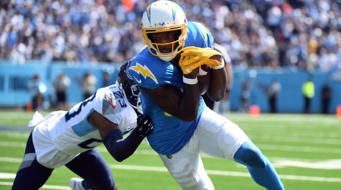 Chargers wide receiver runs with the ball in a game vs. the Tennessee Titans.
